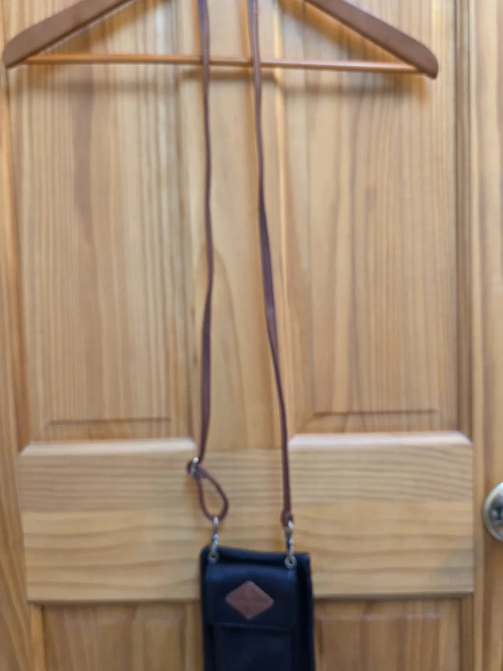 St. Johns Bay Black Crossbody with Brown Strap